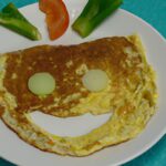 Whip Up a Smile: The Veggie-Packed Funny Face Omelette