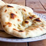 Perfectly Fluffy Individual Naan Breads: A Savory Delight