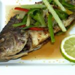 Savor the Flavor: Grilled Whole Fish with Fiery Spicy Sauce