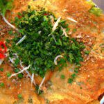 Vietnamese Sizzling Crepes: Crispy Bánh Xèo Unwrapped