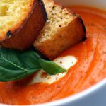 Velvety Cream of Tomato Soup Paired with Garlic Croutons